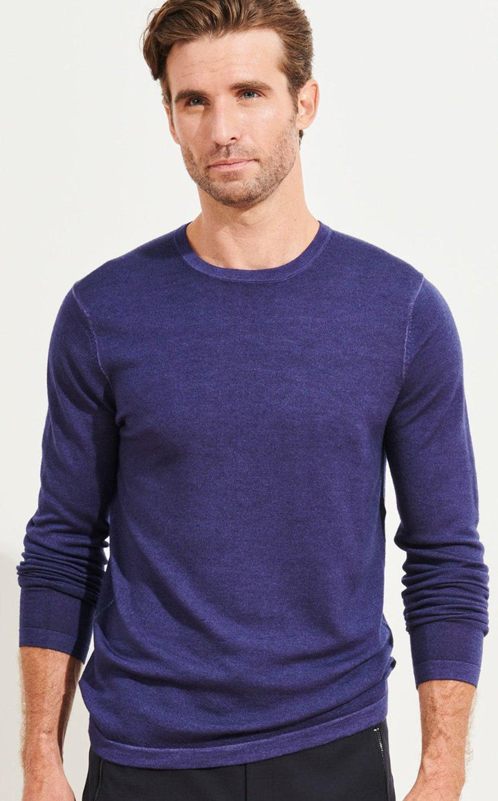 Soft washed merino wool Classic styling with contemporary distressed edges. Light weight and luxurious hand feeling. Open cuffs and waist band. Modern fit is best for slim to moderate builds.  If between sizes order up.