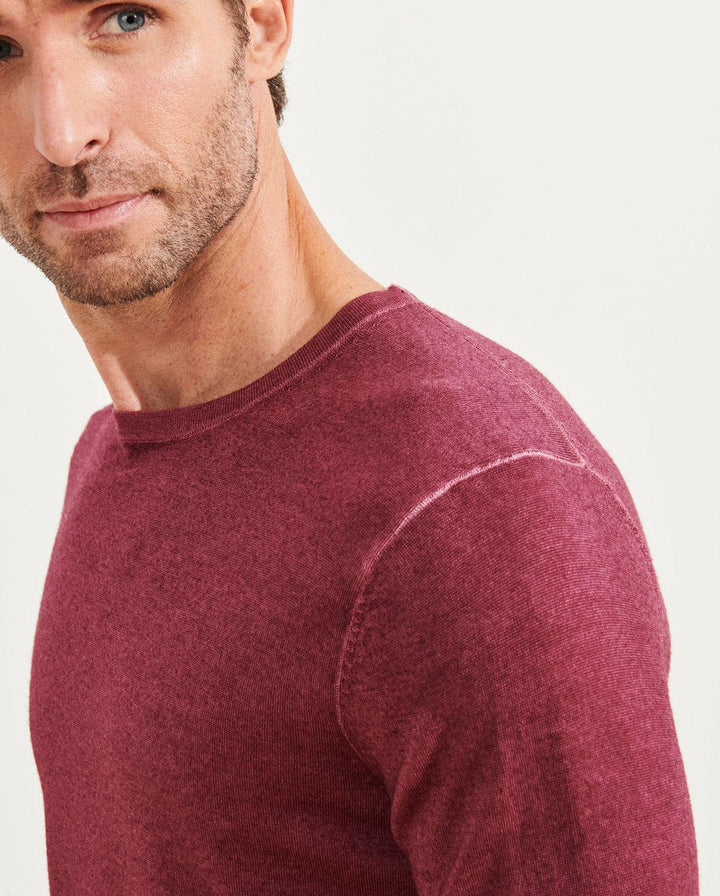 Soft washed merino wool Classic styling with contemporary distressed edges. Light weight and luxurious hand feeling. Open cuffs and waist band. Modern fit is best for slim to moderate builds.  If between sizes order up.